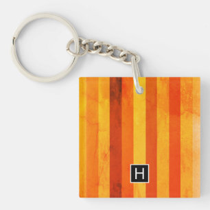Porte-clefs Monogramme rayures orange rouge altéré chaud