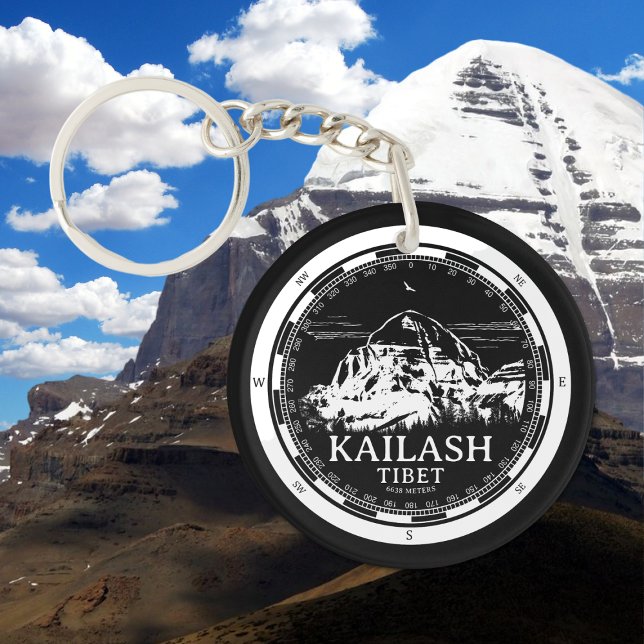 Porte-clefs Mont Kailash - Gang Rinpoché Tibet (Mount Kailash - Gang Rinpoche Keychain in Back with a white compass and mountain illustration)