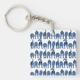 Porte-clefs Motif de chiens bleus qui montrent leurs derrières
