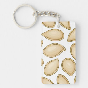Porte-clefs motif de semences citrouille