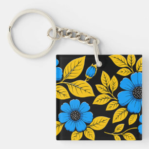 Porte-clefs Motif floral bleu avec feuilles dorées