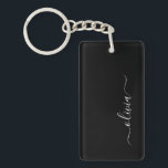 Porte-clefs Noir Blanc Moderne Minimaliste Élégant Monogramme<br><div class="desc">Découvrez notre collection minimaliste moderne de monogrammes noirs et blancs : Faites preuve de simplicité et de sophistication grâce à nos designs minimalistes, conçus pour élever votre style sans effort. Réalisée avec un oeil attentif pour l'esthétique moderne, cette collection présente des motifs noirs et blancs épurés accentués par des monogrammes...</div>