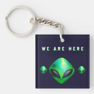 Porte-clefs "Nous sommes ici" Tête d'alien vert
