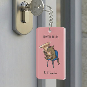 Porte-clefs Œuvre d'art avec jeu de mots sur Tubacabra jouant