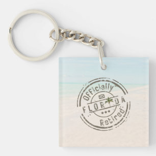 Porte-clefs Officiellement à la retraite sur une plage tropica