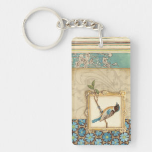 Porte-clefs Oiseau Brown et bleu sur une branche recherchant