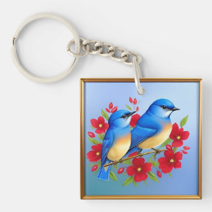 Porte-clefs Oiseaux bleus colorés perchés parmi les fleurs rou