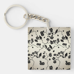 Porte-clefs Oiseaux et fleurs de cerisier à motif noir sur bro
