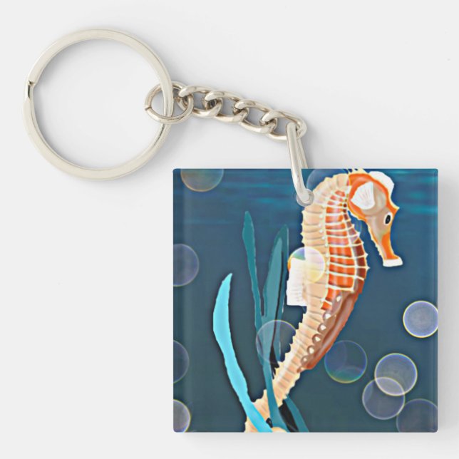 Porte-clefs Orange Seahorse contre la mer avec des bulles (Devant)