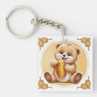 Porte-clefs oso comiendo miel