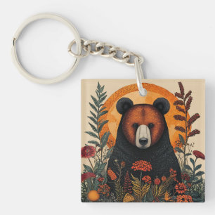 Porte-clefs Ours artistique parmi des fleurs botaniques vibran