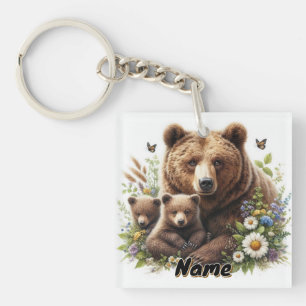 Porte-clefs Ours brun avec des oursons dans une prairie fleuri