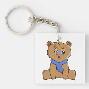 Porte-clefs Ours en peluche portant une écharpe bleue