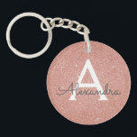 Porte-clefs Pailleté et scintillant monogramme or rose<br><div class="desc">Pailleté et scintillant élégant porte-clés or rose. Ces porte-clés peuvent être personnalisés avec votre initiale et votre prénom et sont un cadeau idéal pour une douche de mariage,  une soirée d'enterrement de vie de jeune fille ou un anniversaire.</div>