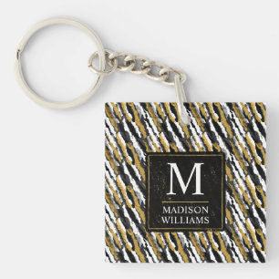 Porte-clefs Paillettes noires et or Motif animal zèbre blanc