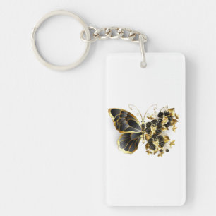 Porte-clefs Papillon fleur d'or avec orchidée noire