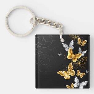 Porte-clefs Papillons blancs et dorés