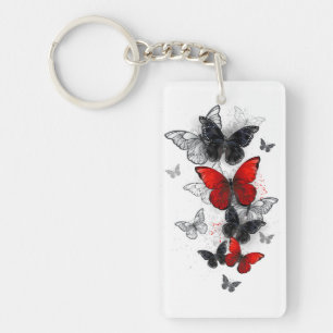 Porte-clefs Papillons noirs et rouges volants
