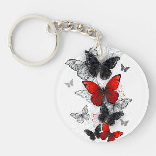Porte-clefs Papillons noirs et rouges volants