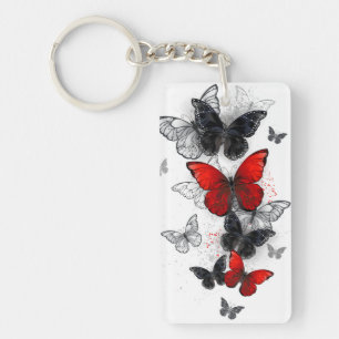 Porte-clefs Papillons noirs et rouges volants