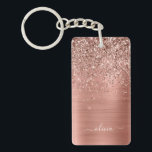 Porte-clefs Parties scintillant rose rose or brossé Monogramme<br><div class="desc">Rose Gold - Blush Pink Faux Foil Parties scintillant à étincelles métalliques brossé Monogramme en métal Nom Porte - clé. Cela rend le cadeau parfait pour 16 ans,  mariage,  douche nuptiale,  anniversaire,  baby shower ou bachelorette pour quelqu'un qui aime le luxe glam et les styles chic.</div>