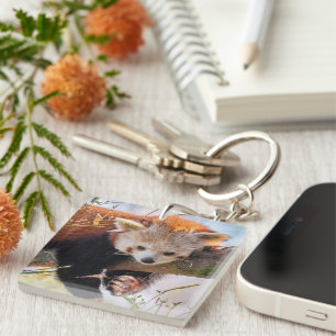Porte-clefs Petit panda rouge pâle