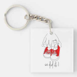 Porte-clefs Petites mains et pieds minuscules prêts à éclater