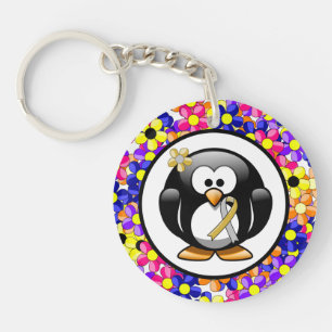 Porte-clefs Pingouin à ruban or et argent