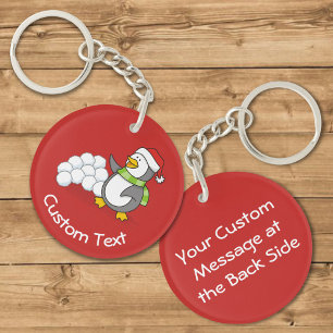 Porte-clefs Pingouin de Noël avec boules de neige brandissant 