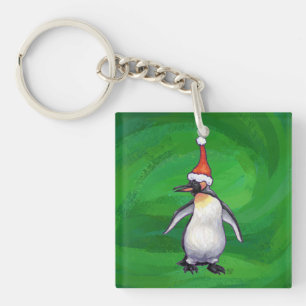 Porte-clefs Pingouin mignon à Santa Hat sur Vert