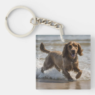 Porte-clefs "Plaisir de bord de mer : Cocker Spaniel à jouer d