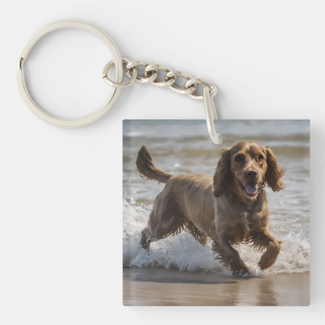 Porte-clefs "Plaisir de bord de mer : Cocker Spaniel à jouer d (Devant)