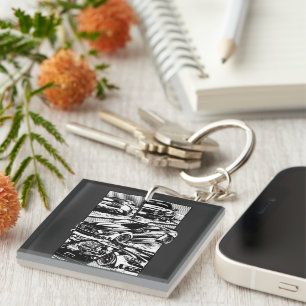 PORTE-CLEFS PLAT DE MUSCLE NOIR ET BLANC