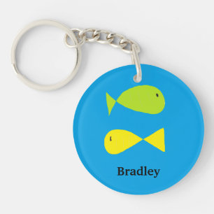 Porte-clefs Poissons verts et jaunes mignons sur le bleu
