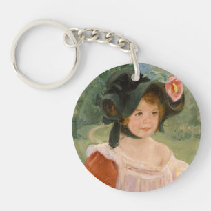 Porte-clefs Ressort : Margot se tenant dans un jardin 1900
