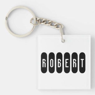 Porte-clefs Robert Mens Nom en noir n blanc,