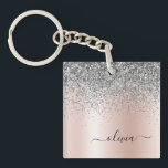 Porte-clefs Rose Gold<br><div class="desc">Or rose - Blush Rose et Argent Faux Foil Parties scintillant étincelante métallique brossé Monogramme de métal Nom Porte - clé. Cela rend le cadeau parfait pour 16 ans,  mariage,  douche nuptiale,  anniversaire,  baby shower ou bachelorette pour quelqu'un qui aime le luxe glam et les styles chic.</div>