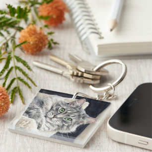 Porte-clefs Rose un chat aux yeux verts saisissants