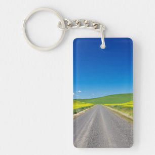 Porte-clefs Route de campagne à travers les champs de canola p