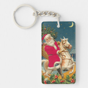 Porte-clefs Santa Claus on a wooden horse