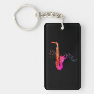 Porte-clefs Saxophone coloré sur la feuille de musique pour sa