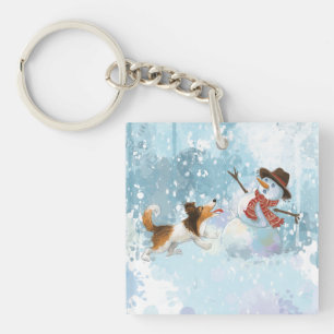 Porte-clefs Sheldon le Sheltie et le Bonhomme de Neige