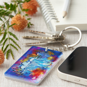 Porte-clefs SlipperyJoe NYC graffiti lune entourée de tourbill
