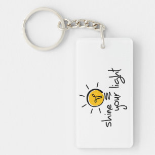 Porte-clefs Slogan shine your light. Faites briller votre lumi