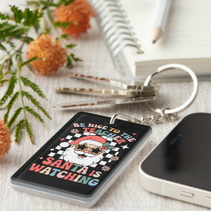 Porte-clefs Soyez gentil avec le Père Noël instituteur regarde