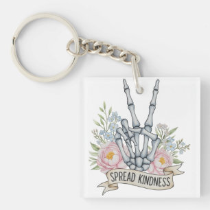 Porte-clefs Squelette de signe de paix "Étendez la gentillesse