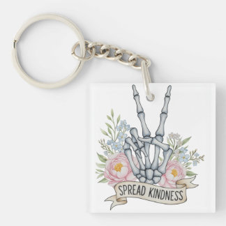 Porte-clefs Squelette de signe de paix "Étendez la gentillesse
