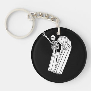 Porte-clefs Squelette Saut hors du panier sur un
