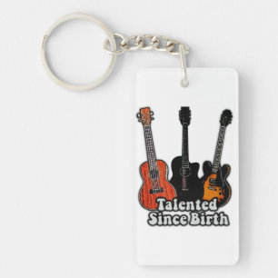 Porte-clefs Talentueux depuis la naissance. Guitares colorées