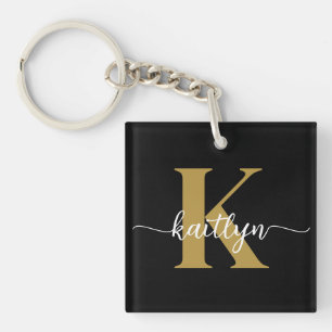 Porte-clefs Tapis de sol monogrammé en noir et or